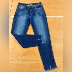 Button fly skinny Kancan jeans.